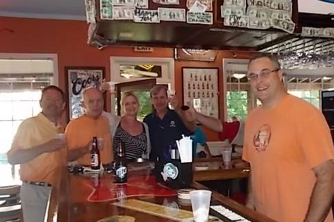 Flat Top Owner Nathan Paris serves some of his brew at the Bayou this week. Photo submitted