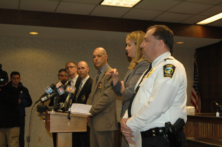 Assistant District Attorney Britt Springer is flanked by members of the Boone Police Department, Boone Planning & Inspections, and the District Attorney's Office. Photo by Jesse Wood