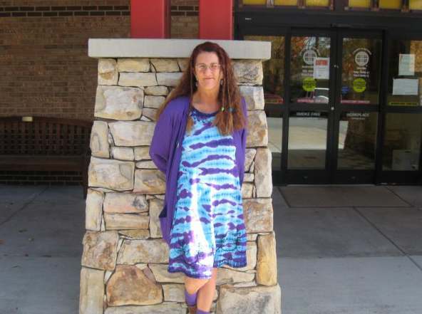 Evelyn Johnson stands in front of the Watauga County Public Library, where she worked for more than 36 years.