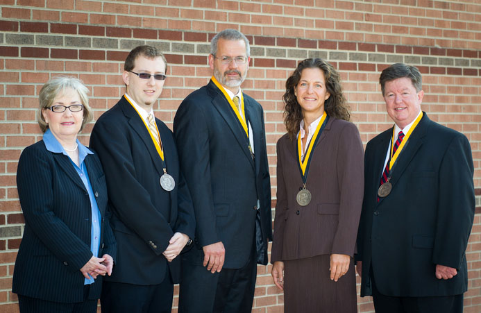 Donna Lindabury, left, Chris Taylor, Ben Powell, Rachel S. Shinnar and Dana Clark have been honored by the Walker College of Business at Appalachian State University. Lindabury received the staff excellence award, Taylor was recognized for his contributions as a non-tenure track faculty member, Powell received the teaching award, Shinnar was honored for her research and Clark was recognized for his service. Photo by University Photographer Marie Freeman