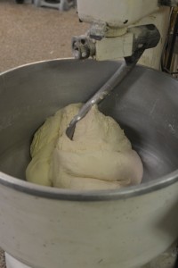 The bread is carefully mixed before being separated into loaves