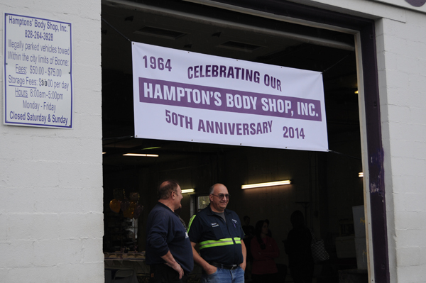 Employees of Hampton's Body Shop at the celebration on Friday.