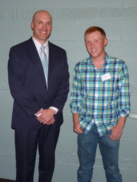Dr. Elliott is shown with Watauga High School student Devin Hollars, first place winner of the state level SkillsUSA carpentry competition.