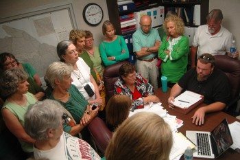 The infamous first meeting with the new board members in 2013. A video of this meeting went viral on YouTube and made national headlines. Photo by Jesse Wood