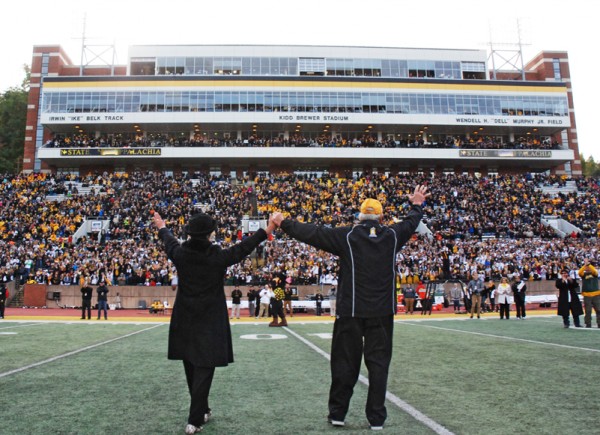 Former head coach Jerry Moore and his wife, Margaret, take in a special day at Kidd Brewer Stadium on Saturday. 