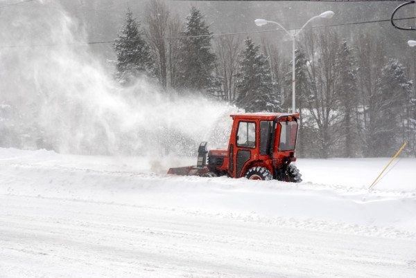 Local snow removal crews work to clear the roads during a winter storm over the weekend of Jan. 22-24, 2016. Photo by Ken Ketchie.