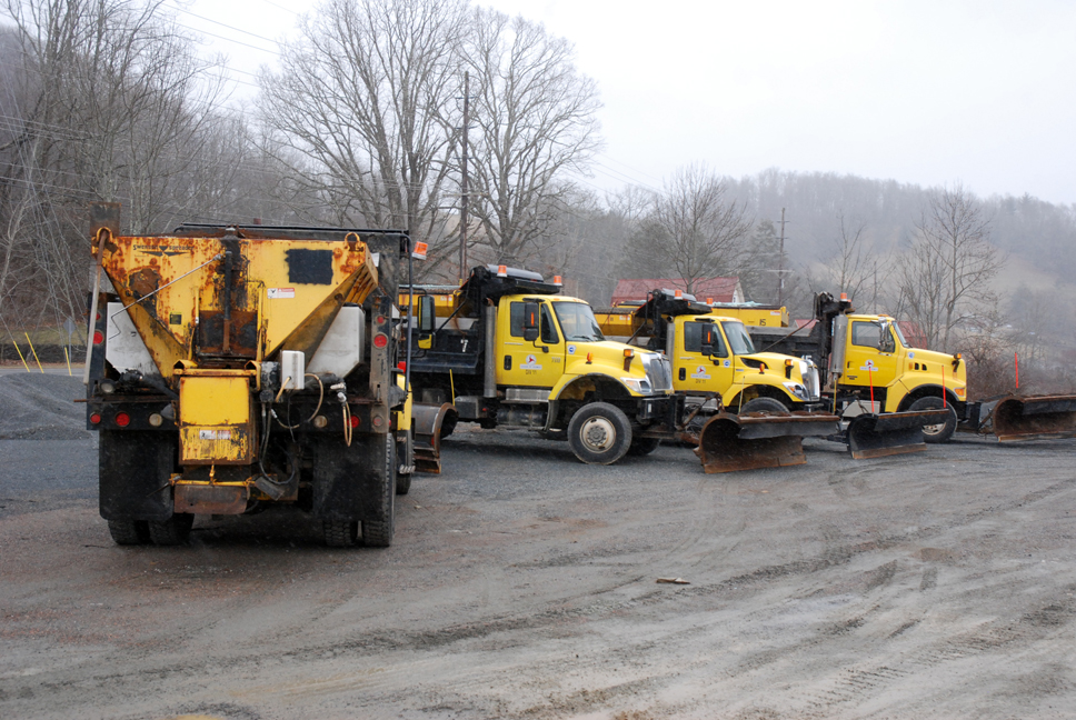 NCDOT trucks are ready to battle the winter weather on Wednesday. Photo by Ken Ketchie