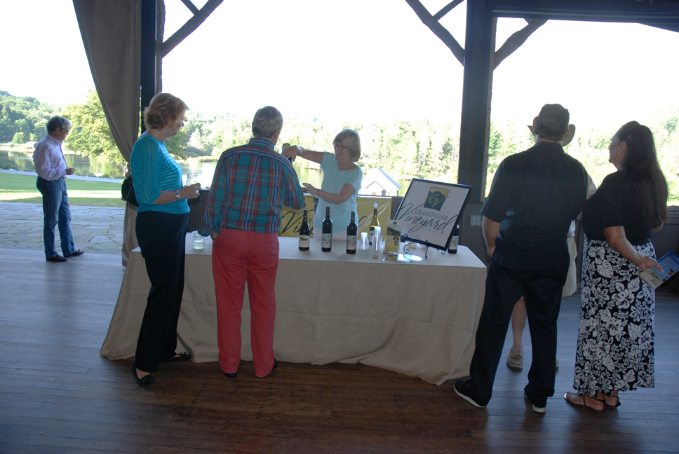 Guests enjoying a sip of wine.