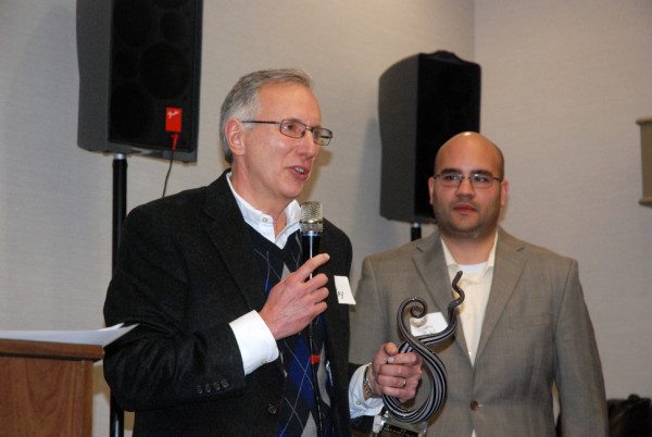 Ray Russell of Ray's Weather receives the Small Business of the Year Award at Thursday's After Hours event at La Quinta. Photo by Ken Ketchie.