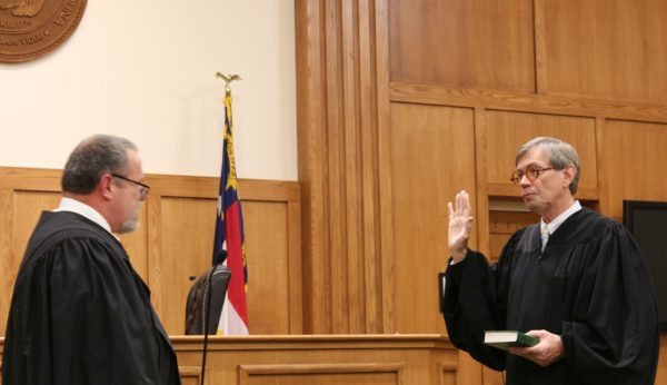 The Honorable Hal Harrison from Mitchell County was sworn in to his second term as District Court Judge.