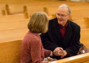 At a MHM concert in December, Julie Williamson and Joe Shannon share memories of Appalachian State University when Joe was a professor over 20 years ago. Photo by Lonnie Webster