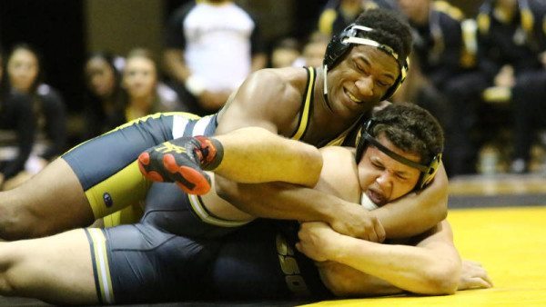Denzel Dejournette pinned James Romero for the Mountaineers only points of the night in the loss to NO. 5 Missouri on Friday. Photo by Rob Moore / App State Athletics