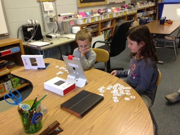 Green Valley students benefit from a WEF grant.  Makenlea Hayes and Bryce Miller enjoy learning to spell by using the OSMO game system that works with their teacher’s I-Pad, which was made possible by a grant from the Watauga Education Foundation, which was raised with funds from the Flapjack Flip.