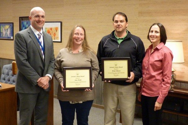 The Servant's Heart Award for April was presented to both Jane Shook (second from left) and Brian Johnson (second from right) for their extraordinary assistance in the installation of new and more accessible playground equipment at Hardin Park School. Dr. Elliott (far left) and Hardin Park Principal Mary Smalling (far right) are shown with Shook and Johnson. Elliott praised Shook and Johnson as "exceptional people who are both doers and dreamers. We are grateful for all they have done for our students."