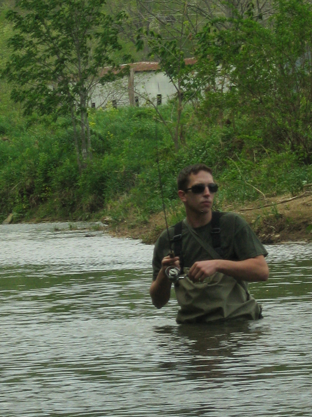 A man fishes on the Watauga River in Valle Crucis. Photo by Jesse Wood