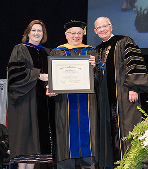 Peter Petschauer receiving his honorary degree
