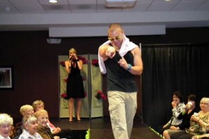 Emcee Gwen Dhing and Model Andrew Mackorell from last year’s fashion show.