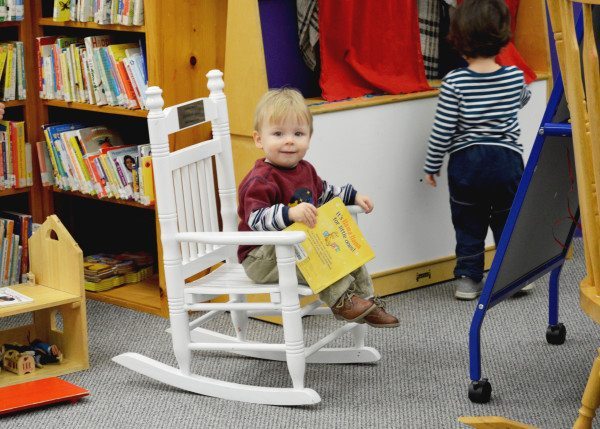 A little reader enjoys daily story time at the Watauga County Public Library.