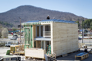 Appalachian State University’s entry in Solar Decathlon Europe 2014 is a two-bedroom, two-bath row dwelling. Its energy efficient features include rooftop solar panels, an energy-efficient building exterior and an integrated plumbing, mechanical and electrical system. Photo by Marie Freeman