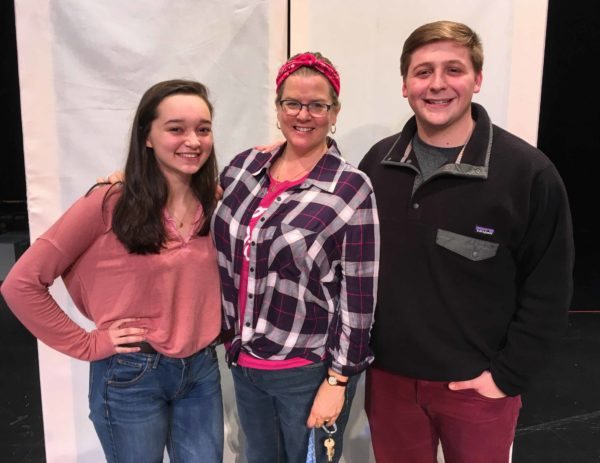 Rachel Sabo-Hedges, Sarah Miller and Collin Linville on stage at WHS with a piece of ‘Mea Cupla’s’ set.